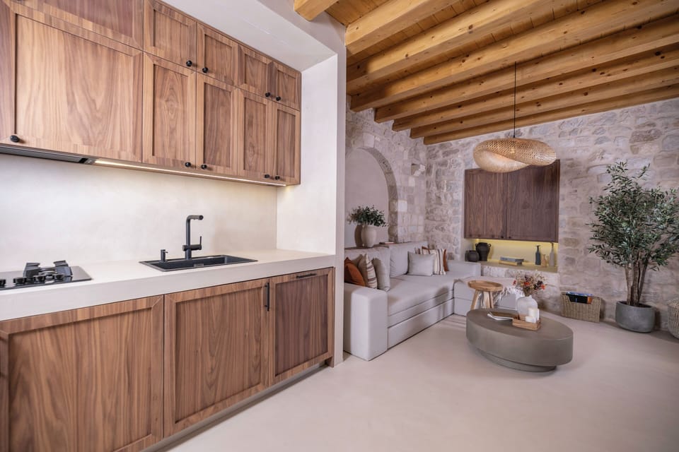 Deluxe Apartment, City View | Living area | 55-inch Smart TV with satellite channels, heated floors