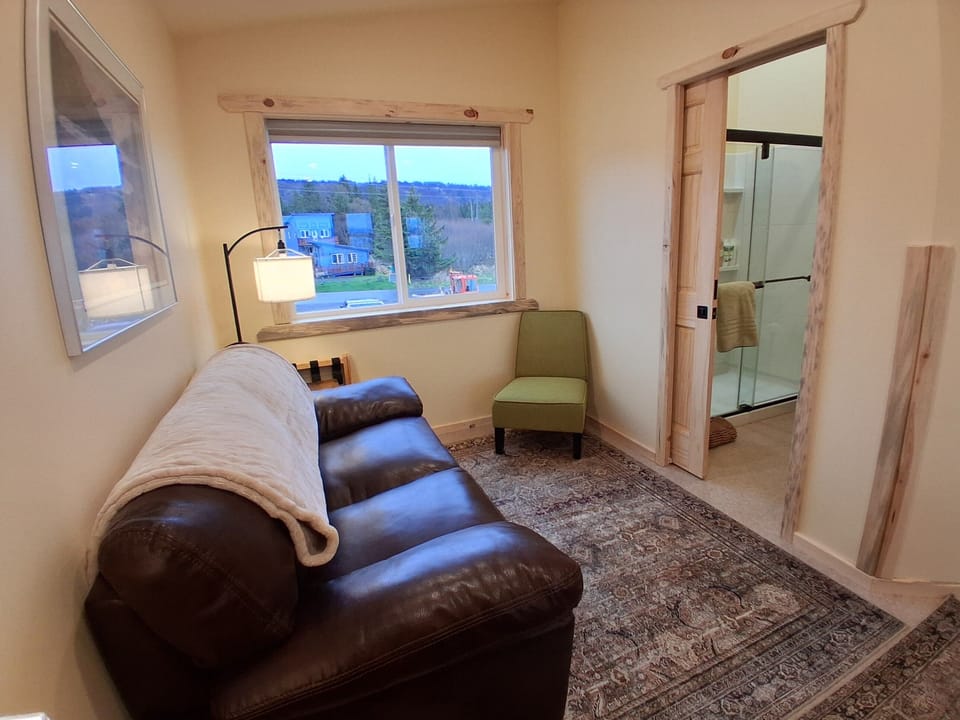 ENJOY YOUR LUXURIOUSLY LARGE SHOWER CURL UP WITH A BOOK ON YOUR COMFY SOFA