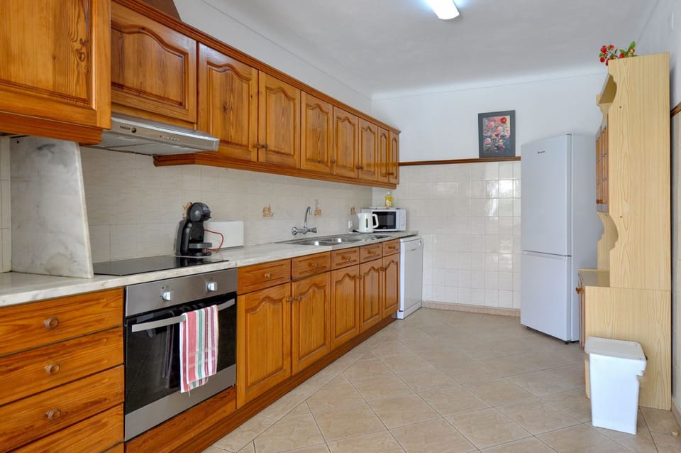 Kitchen with access to pool area