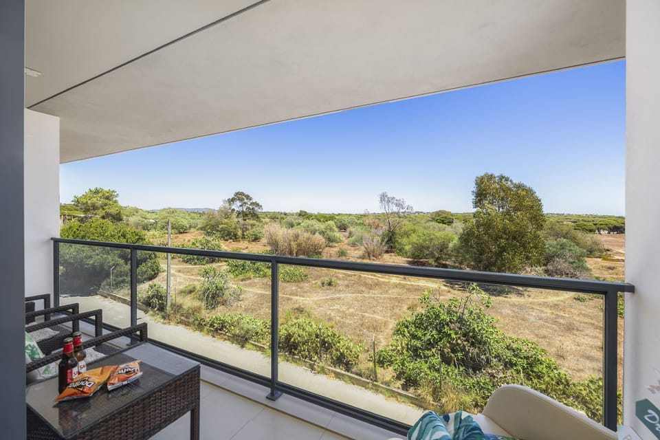 Balcony view of countryside and beach areas