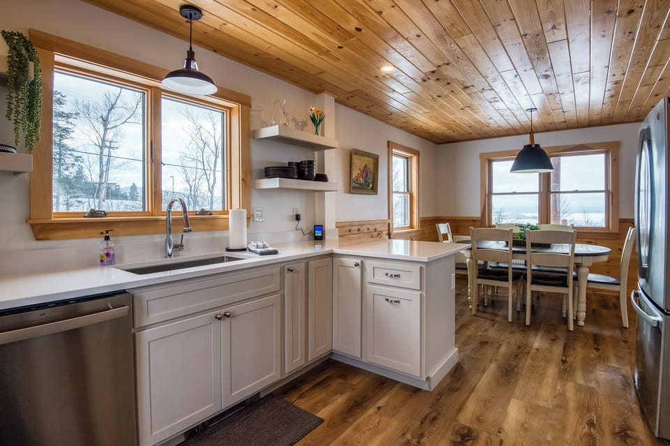 Full kitchen with view of dining area