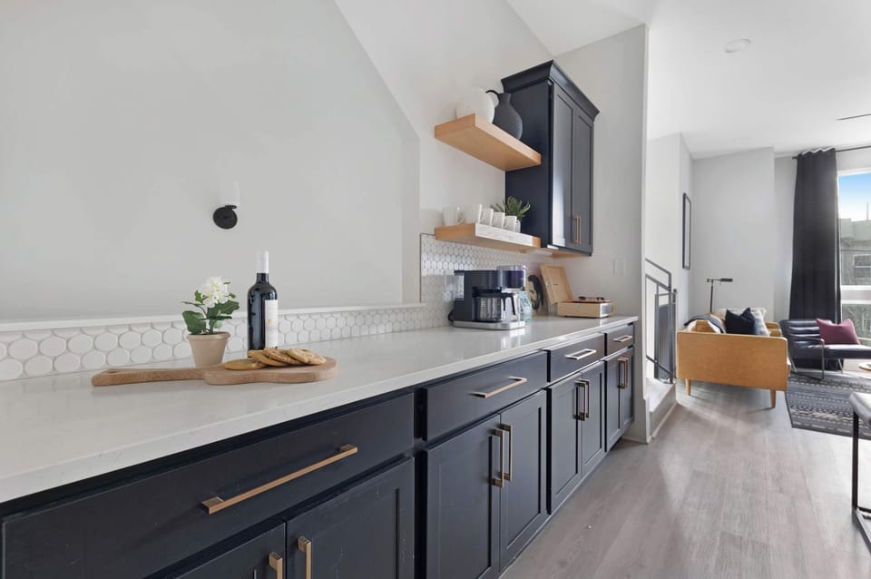 Fully Stocked Kitchen with Modern Appliances and Ample Storage

