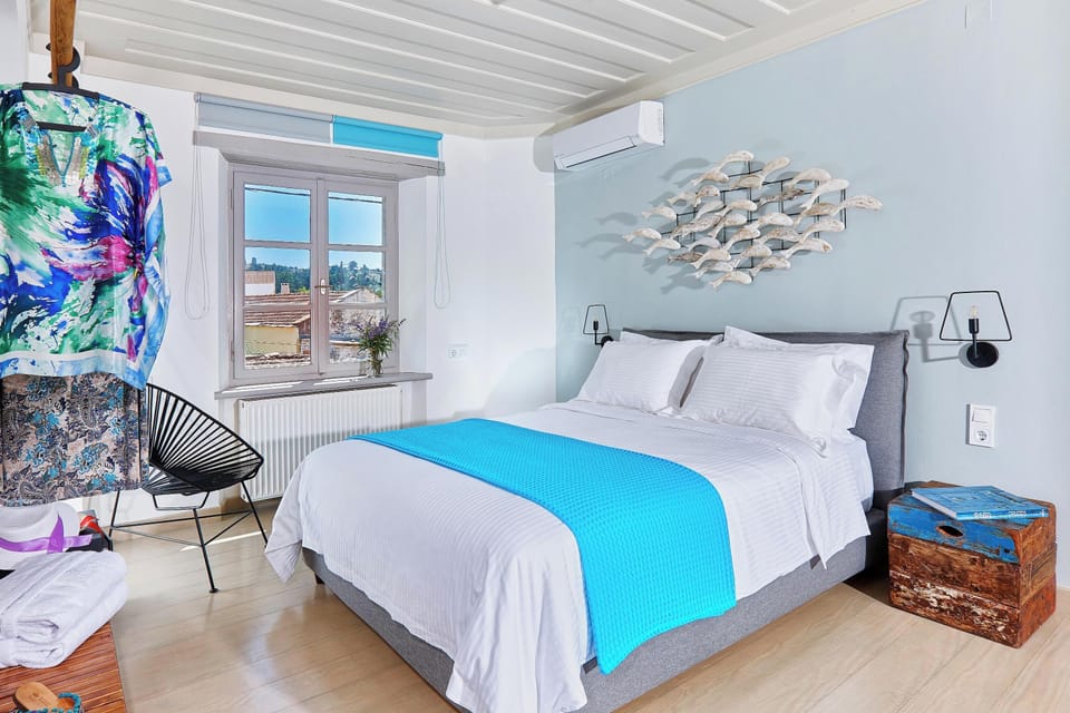 This master bedroom features a queen size bed and is located on the second floor