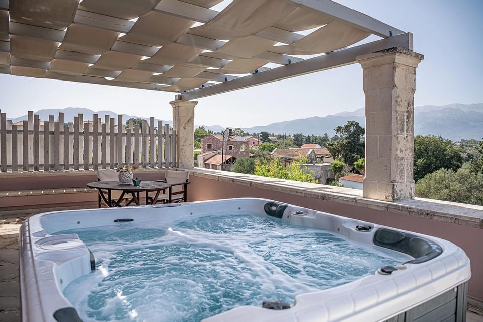 Step out onto the private balcony, where a five-seat hot tub awaits