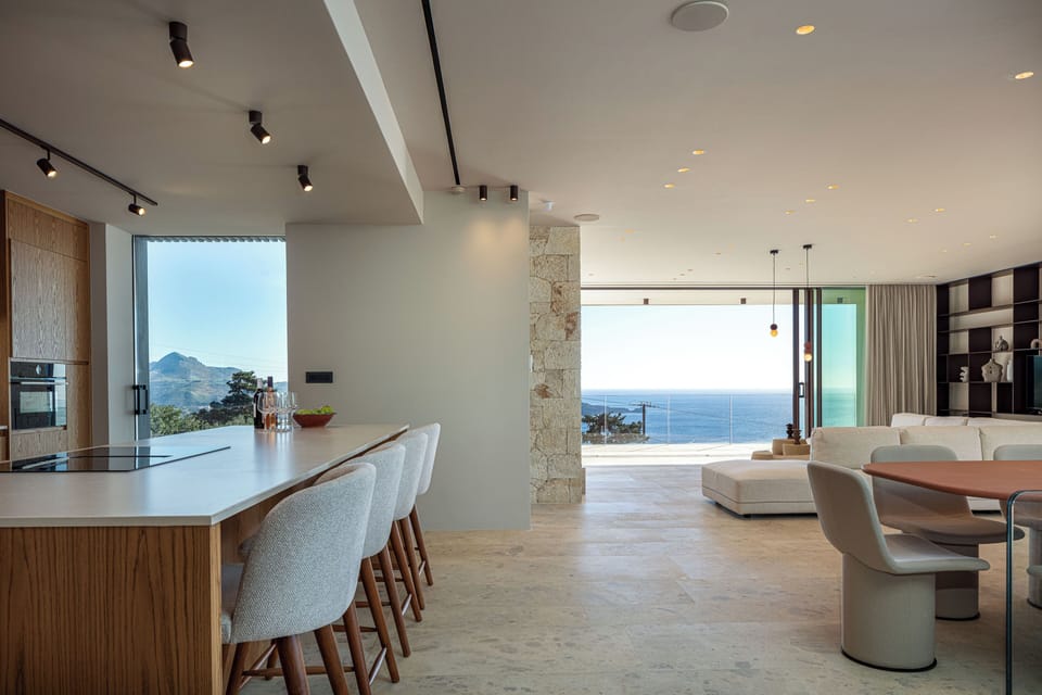 The central island with seating for four is an ideal spot to savor your morning coffee