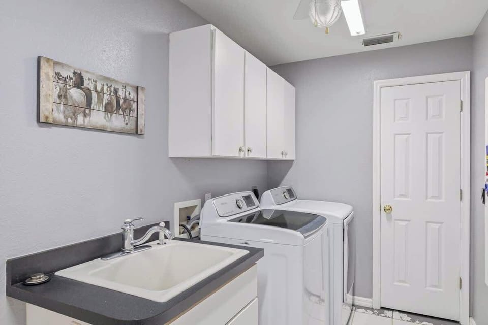 Enjoy the convenience of a washer and dryer in the home, perfect for longer stays and keeping your clothes fresh. #LaundryConvenience #HomeComfort