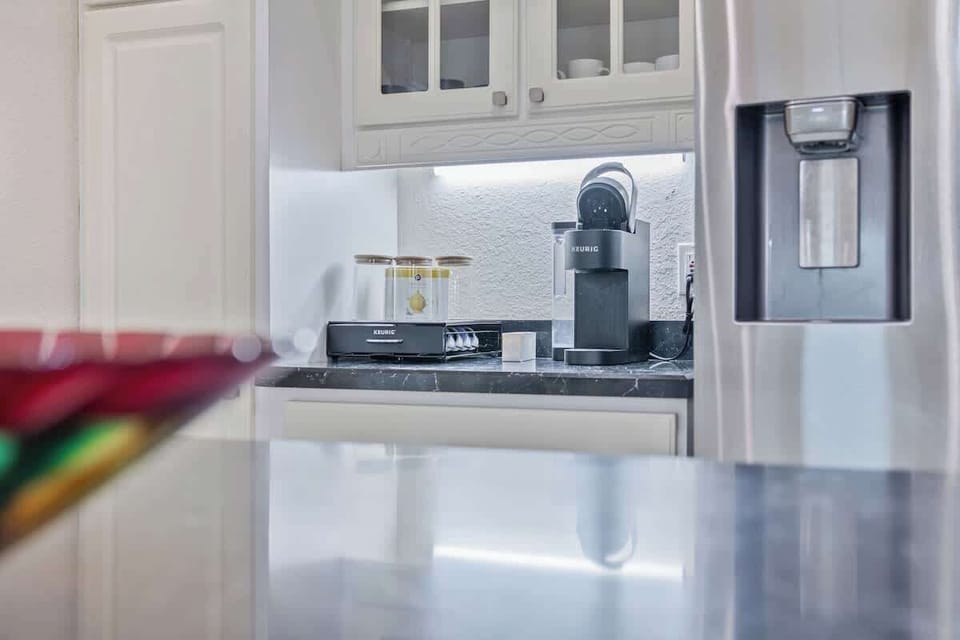 Start your day with a fresh brew from the coffee maker, located in the fully equipped kitchen for your convenience. #CoffeeLovers #MorningBrew