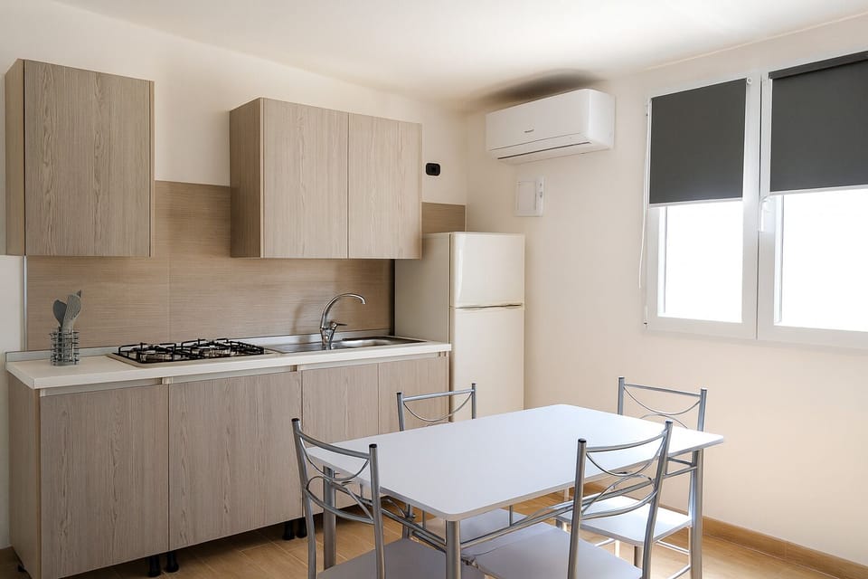 Deluxe Bungalow, Sea View | Private kitchen | Fridge, stovetop, highchair, cookware/dishes/utensils