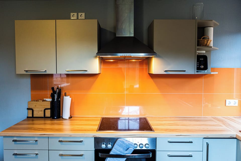 Family Apartment, 2 Bedrooms, Balcony, Garden View | Private kitchen | Highchair