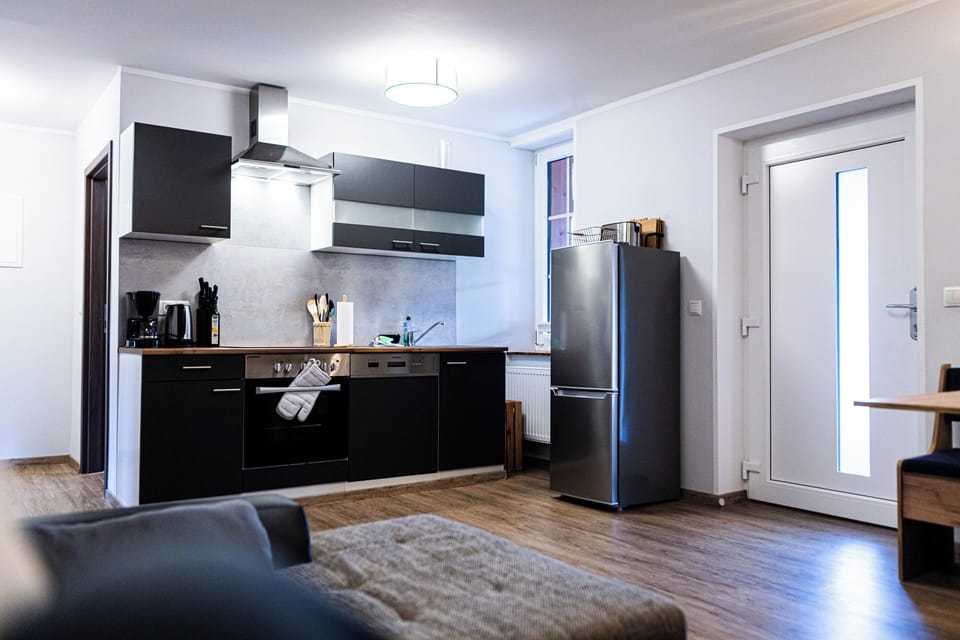 Family Apartment, Balcony, Garden View | Private kitchen | Highchair