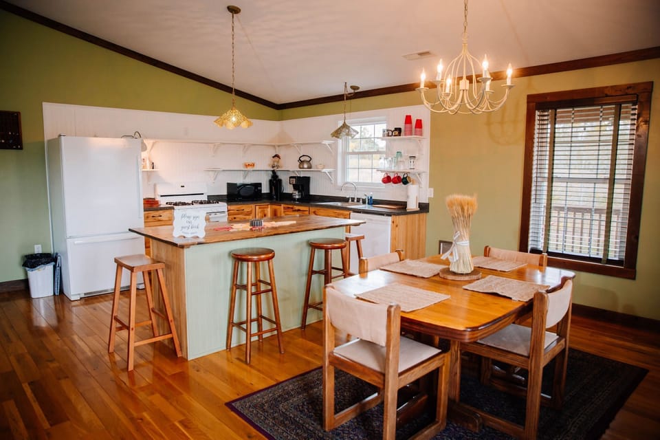 Modern appliances, spacious countertops, and a warm dining area perfect for family meals.