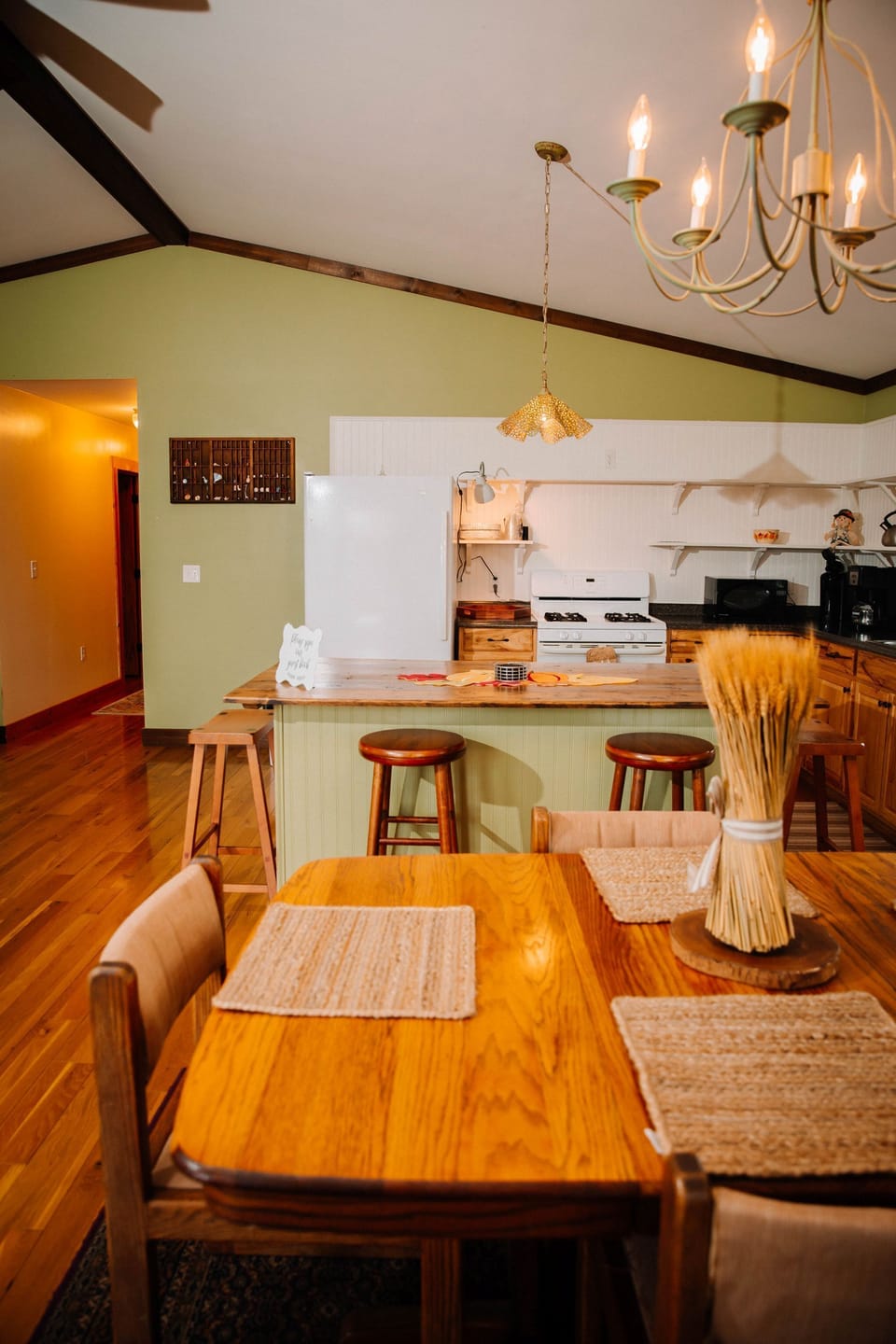  Fully equipped kitchen with bar seating and an adjacent dining space that's perfect for hosting and daily dining.