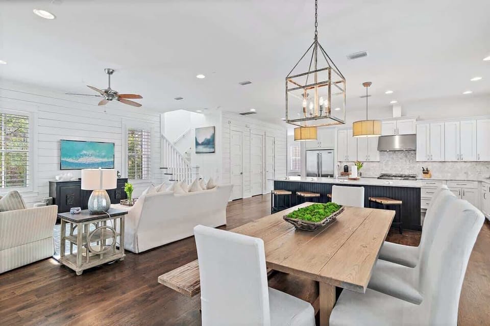 - Gather, cook, and unwind all in one airy space with cozy seating and warm wood floors - Dining table is perfect for shared meals, game nights, or morning spreads - With a chef’s kitchen and inviting flow, it’s made for memories together