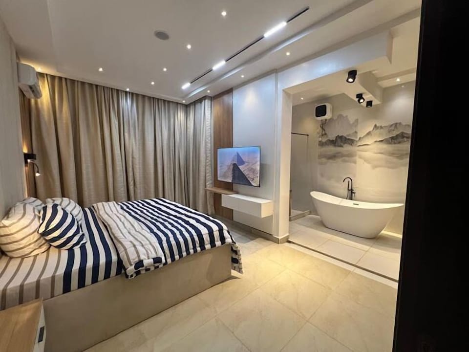 Deluxe Room, Balcony, City View | Desk, laptop workspace, free WiFi