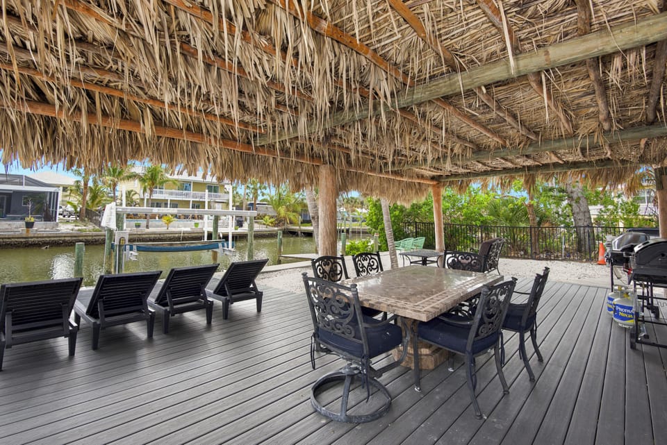 Outdoor dining area next to canal.
