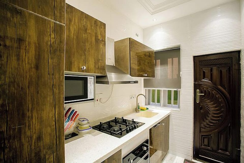 Deluxe Apartment, Balcony, City View | Private kitchen | Fridge, microwave, oven, stovetop