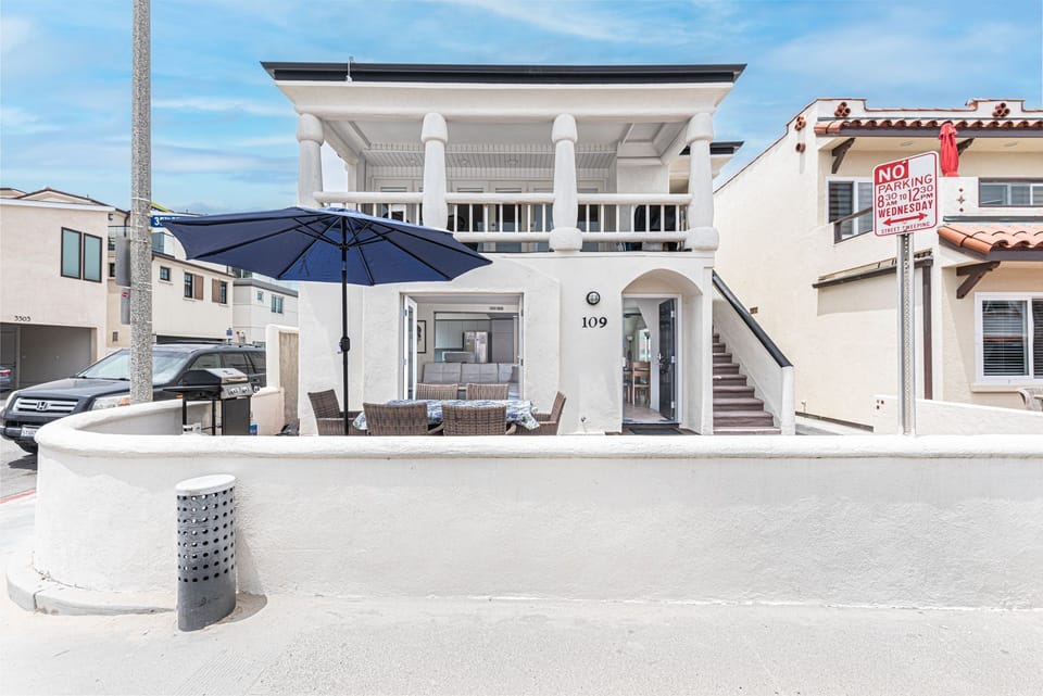 Enjoy both the ground floor and upper residence in this charming Newport Beach retreat
                