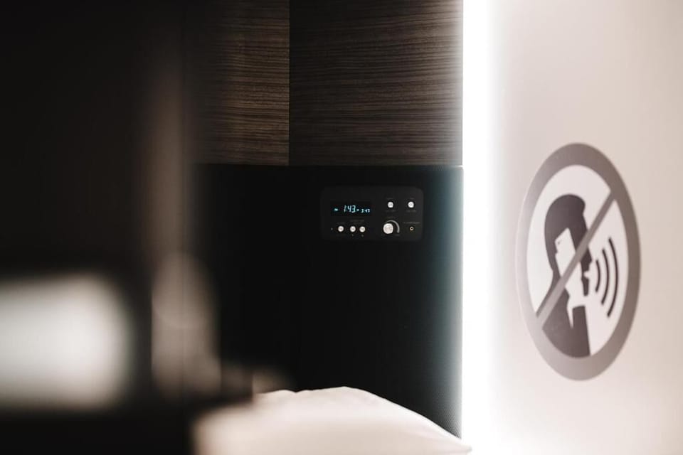 Sleeping Cabin (Mixed Gender) | Premium bedding, memory foam beds, desk, laptop workspace