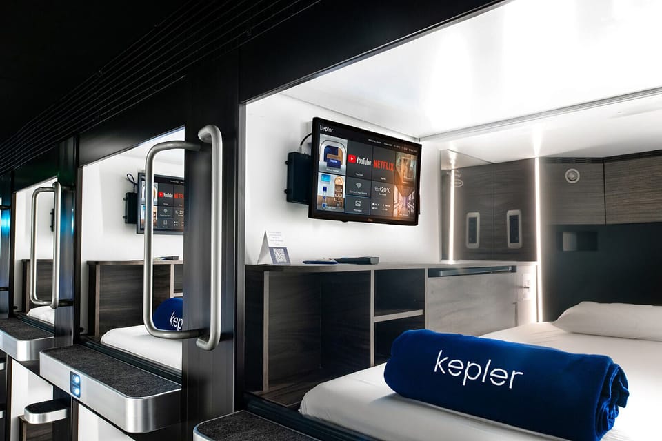 Premium bedding, memory foam beds, desk, laptop workspace