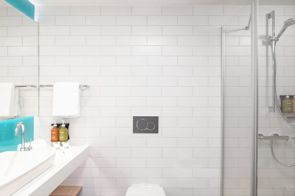 Shower, rainfall showerhead, eco-friendly toiletries, hair dryer