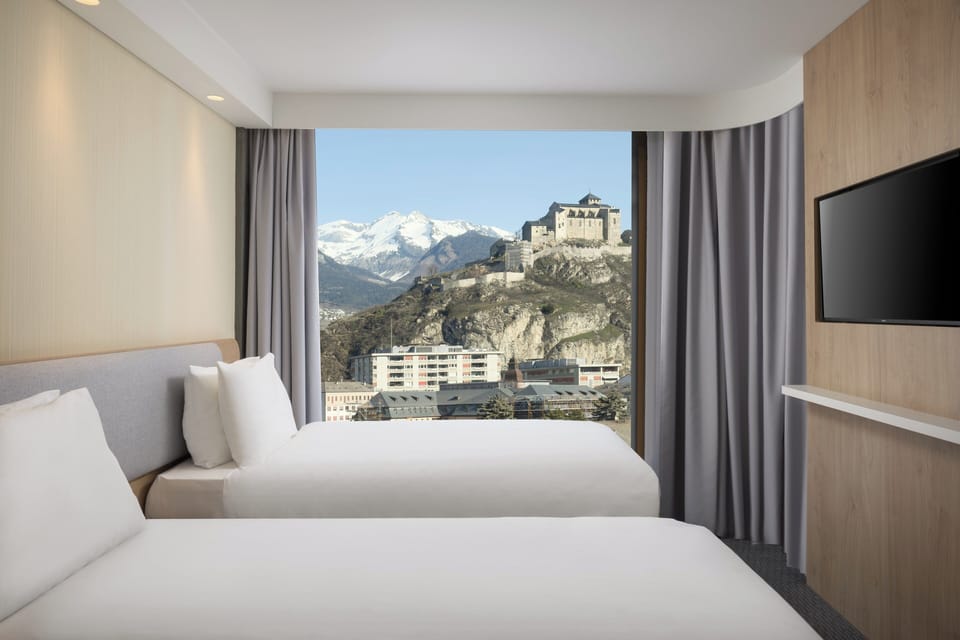 Premium bedding, pillowtop beds, in-room safe, desk