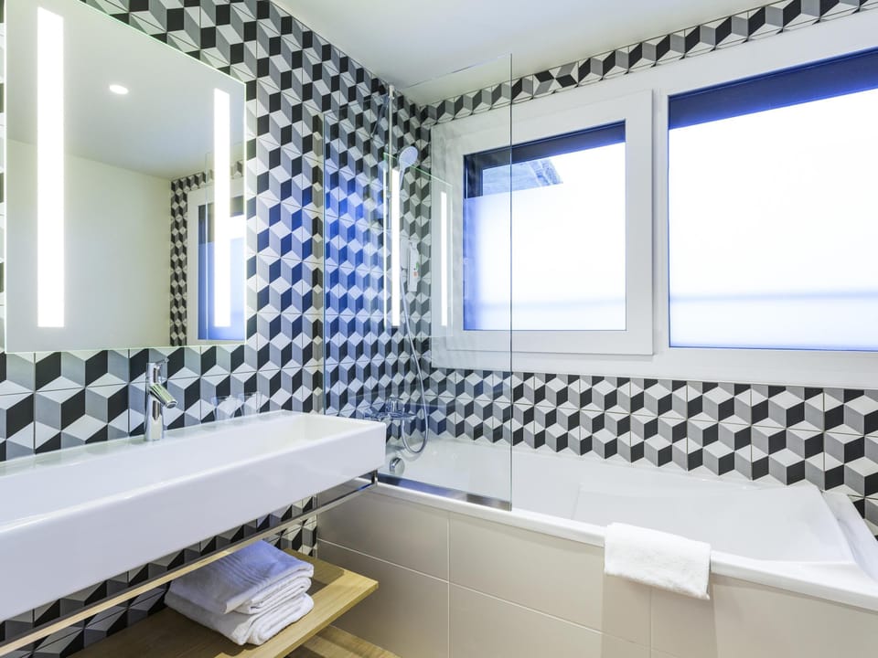 Standard Suite, Multiple Beds | Desk, blackout drapes, soundproofing, iron/ironing board