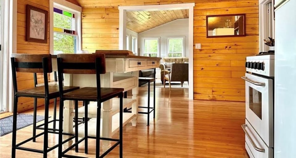 Eating area overlooks a back deck 
Open to the living space.