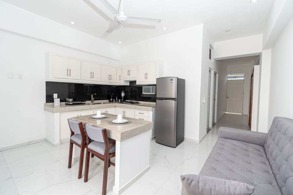 Standard Double Room | Private kitchen | Fridge, microwave, cookware/dishes/utensils