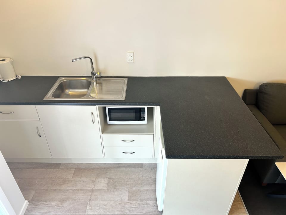 2 - Bedroom Apartment | Private kitchen | Mini-fridge, microwave, toaster, cookware/dishes/utensils