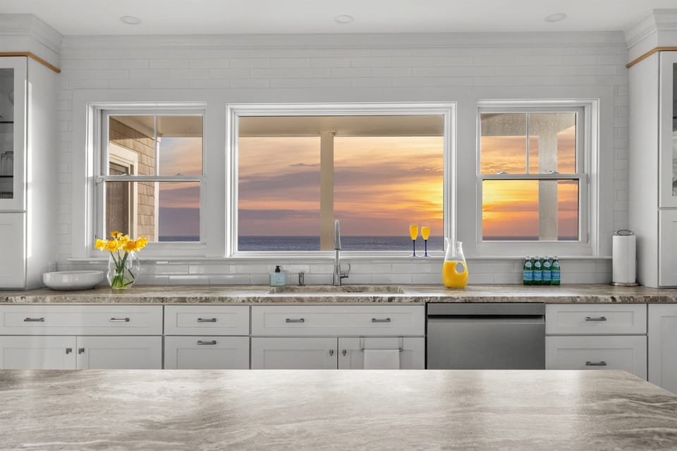 When hunger strikes, the third-floor kitchenette with a sink and bar fridge is the perfect spot to grab a quick treat.