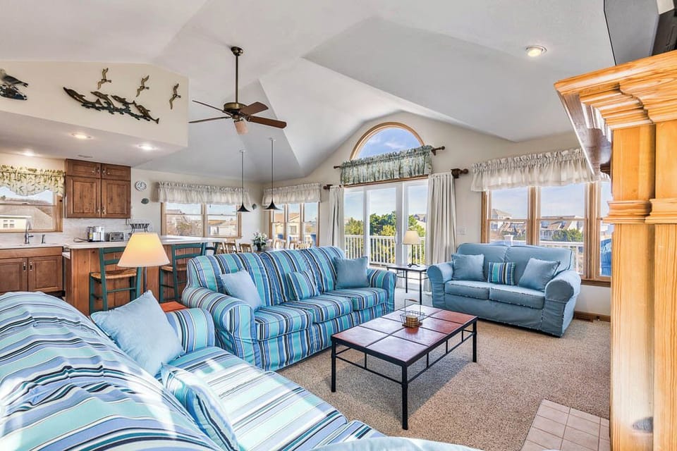 Top-Level Living Room with Deck Access