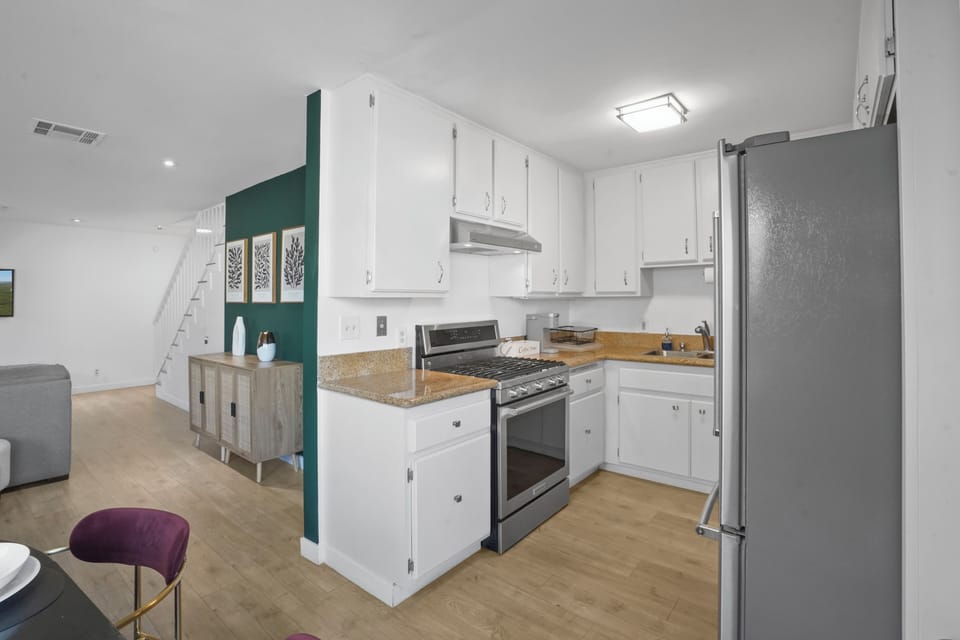 Kitchen and partial Dining/Living room view.