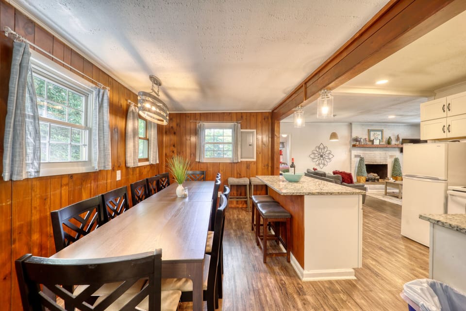 The whole dining area, extra seating with high chairs and a kitchen island.