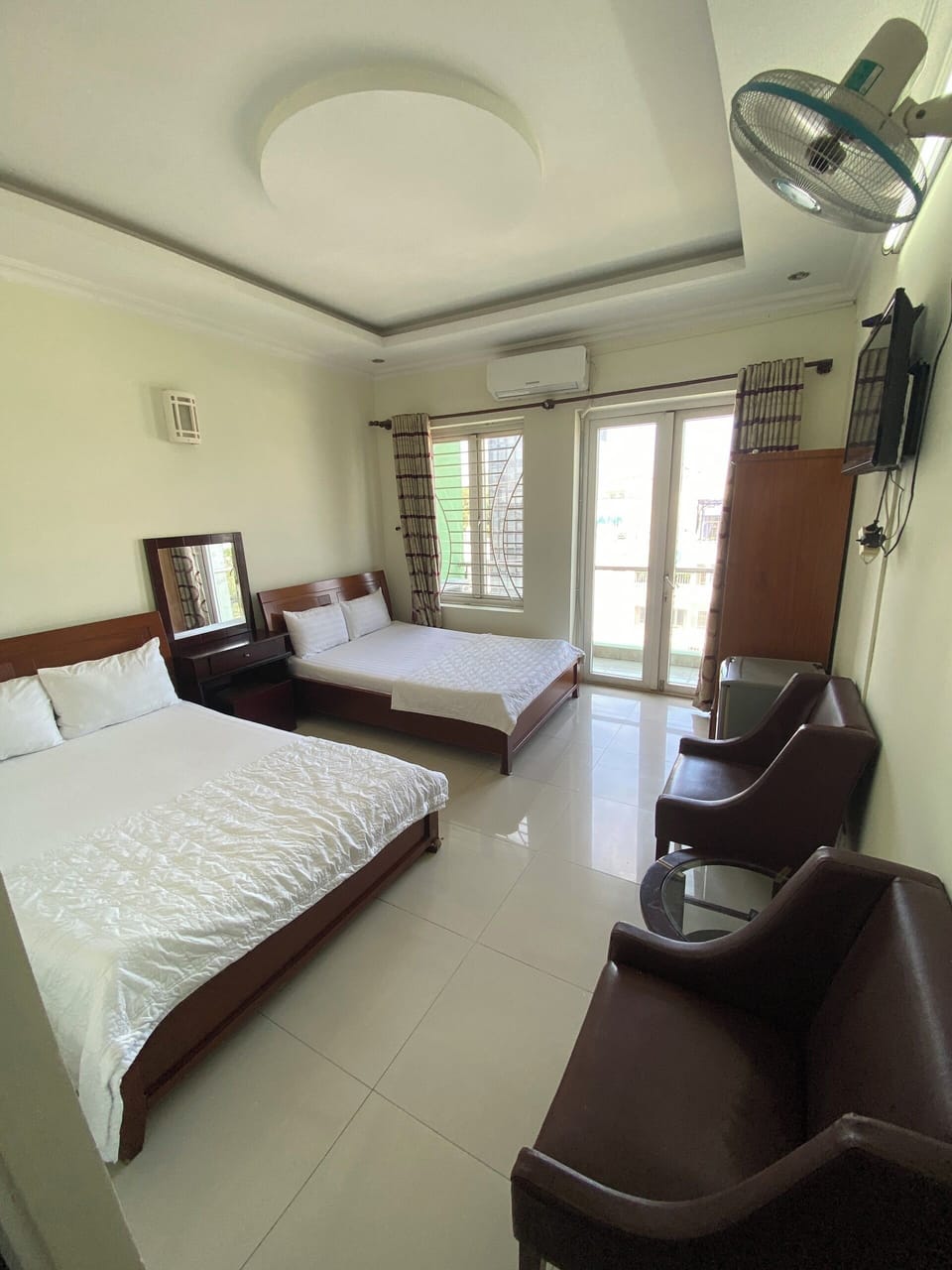 Family Quadruple Room, Balcony, City View | Minibar, desk, blackout drapes, soundproofing