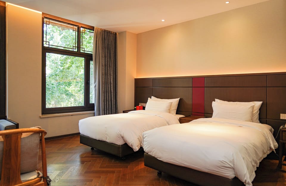 Superior Double or Twin Room | Down comforters, minibar (free items), desk, laptop workspace