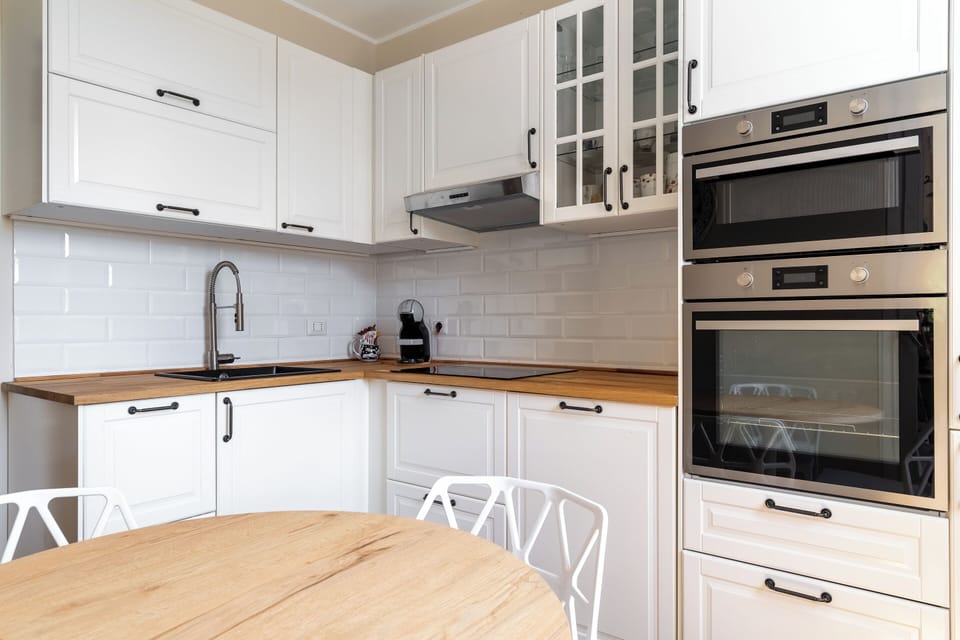 Deluxe Villa, Pool View | Private kitchen | Electric kettle, highchair