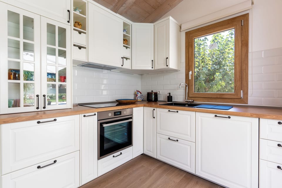 Deluxe Villa, Pool View | Private kitchen | Electric kettle, highchair