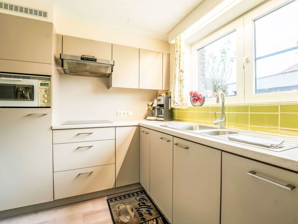 Kitchen, Countertop, Kitchen Appliance, Cabinetry, Major Appliance, Interior Design, Wood, Flooring, Kitchen Sink, Plumbing Fixture