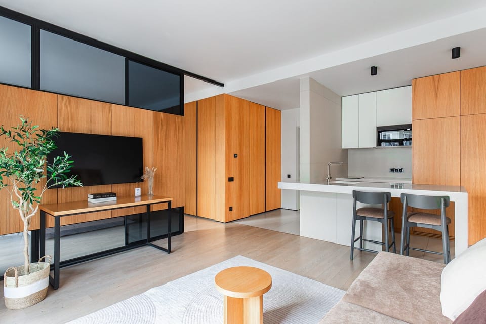 Luxury Apartment, Courtyard View | Living area | Flat-screen TV