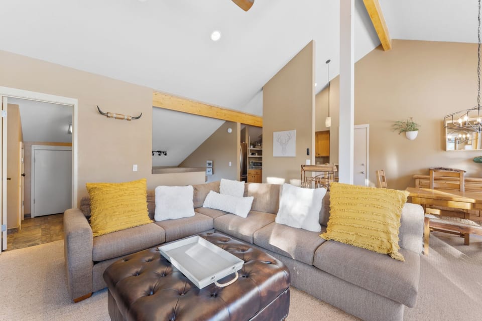 Sink into plush seating where warm sunlight streams through windows, creating the perfect spot to unwind after your adventures.