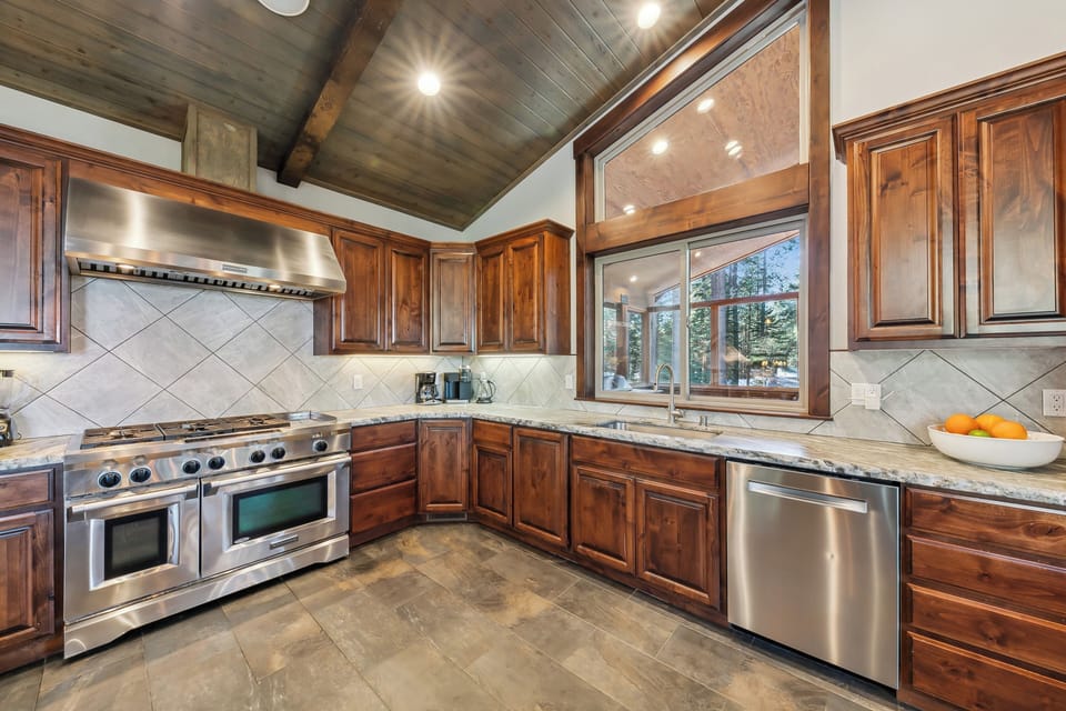 Stainless steel appliances in the kitchen with lots of storage