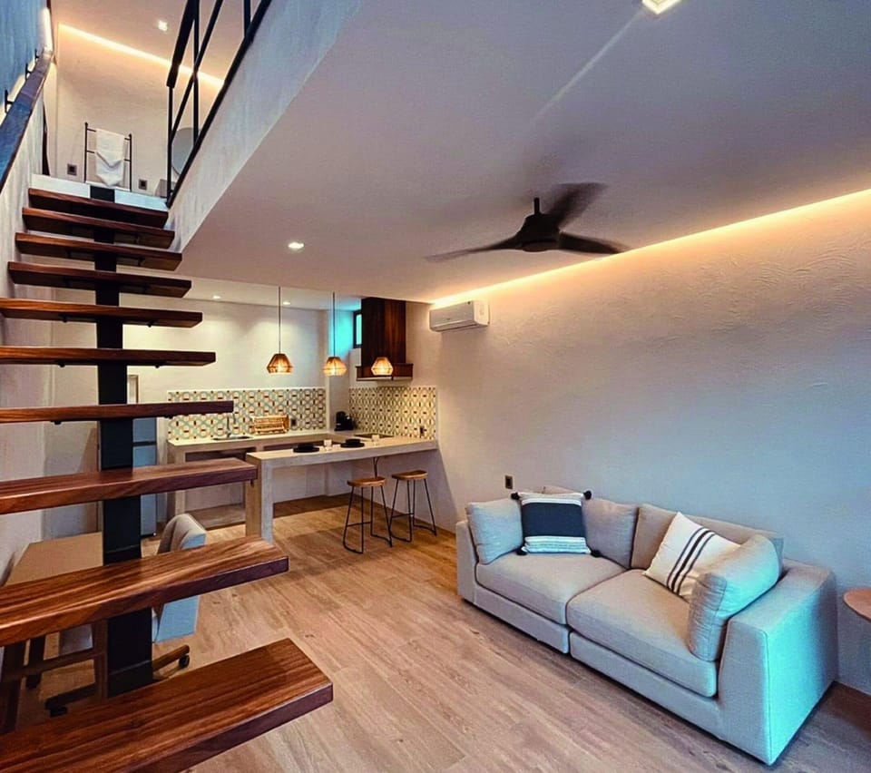 Senior Duplex, 1 Bedroom, Pool View | Living area | 50-inch Smart TV with digital channels, Netflix, streaming services