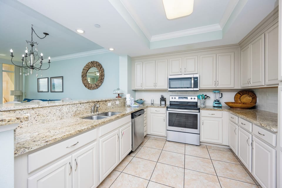 Prepare delicious meals in the kitchen, where stainless appliances and ample counter space await your culinary creations