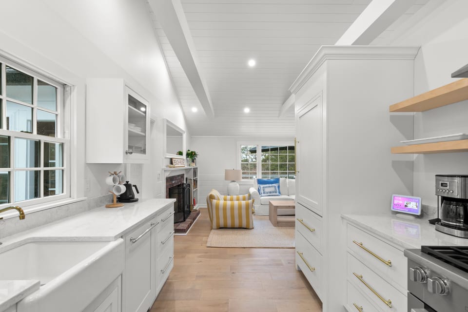 View of kitchen and living room from the front door 
