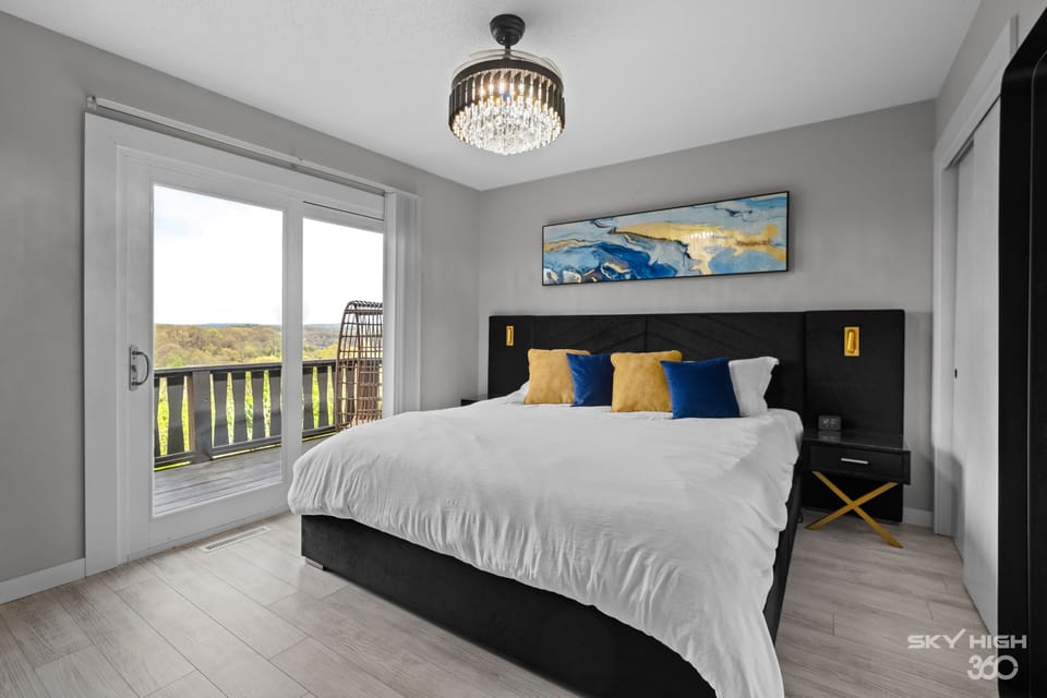 Luxury king bed. Upper level bedroom with a beautiful view.