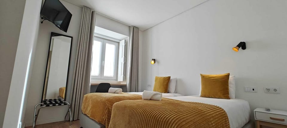 Twin Room, 2 Twin Beds | In-room safe, desk, laptop workspace, blackout drapes