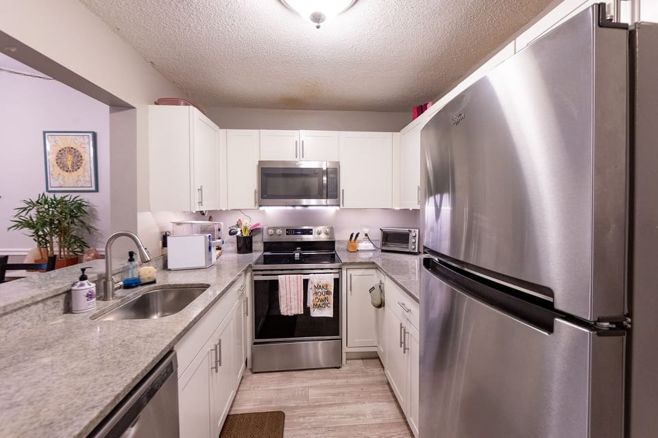 Open Concept Kitchen With Bar Pass