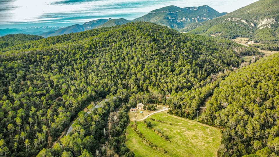 Savor the sweeping mountain views at Rural holiday home El Molí in La Garrotxa, a pet friendly vacation home with a spacious outdoor area.