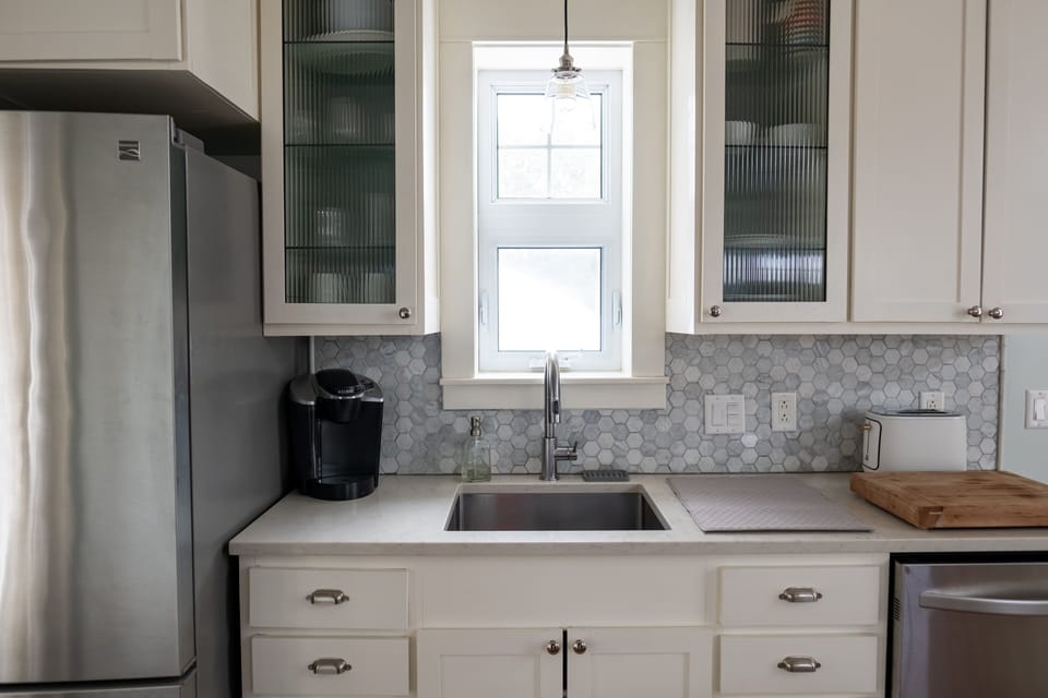 Kitchen space with full fridge and freezer