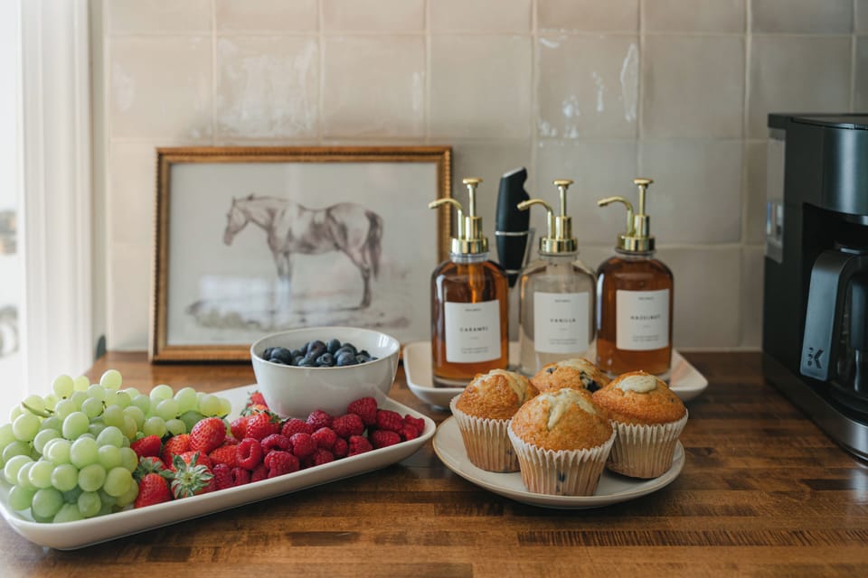 Enjoy host-provided drip- and Keurig coffee with flavored syrup.